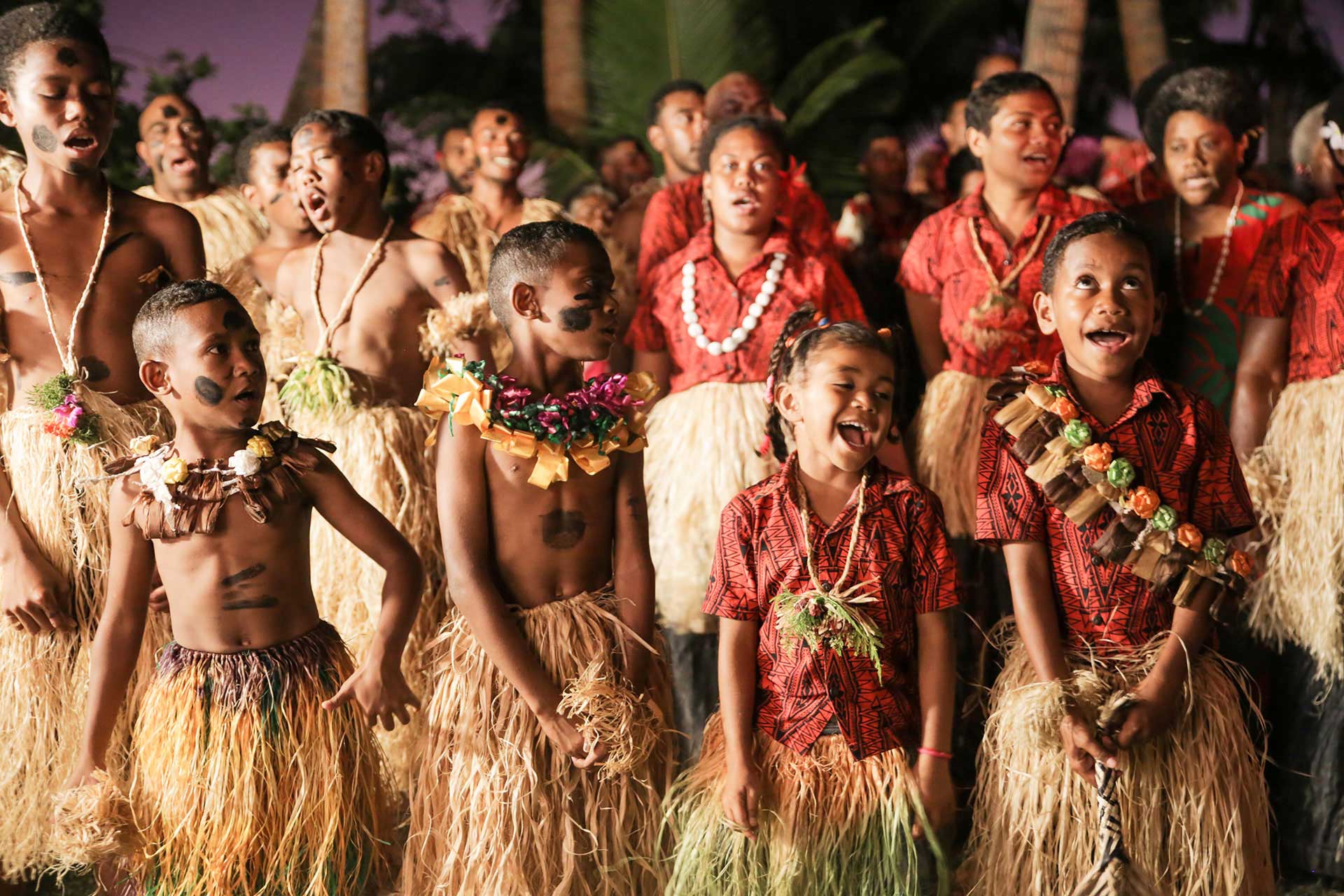 1-All-Inclusive-Vacation-Packages-Fiji Every meticulously Fijian crafted detail seamlessly integrates into yourAll-Inclusive Vacation Packages Fiji. Image shows a Fijian cultural experience.