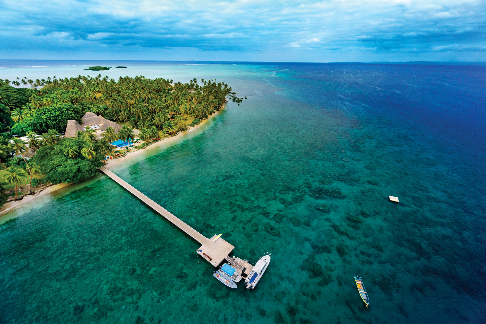 6-Private-Island-Fiji--Luxury-Travel Aerial view of the Peninsula at JMCR with the Private island in the background