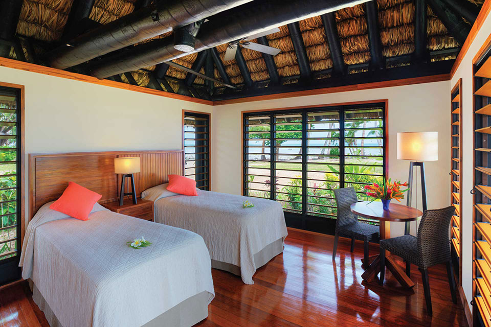 fiji-oceanfront-beach-resort-2-bedroom-deluxe-bure2 An image of a Fiji Deluxe Oceanfront 2 Bedroom Bure at Jean-Michel Cousteau Resort Fiji.